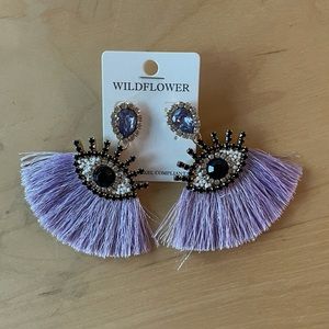 Eye earrings with fringe